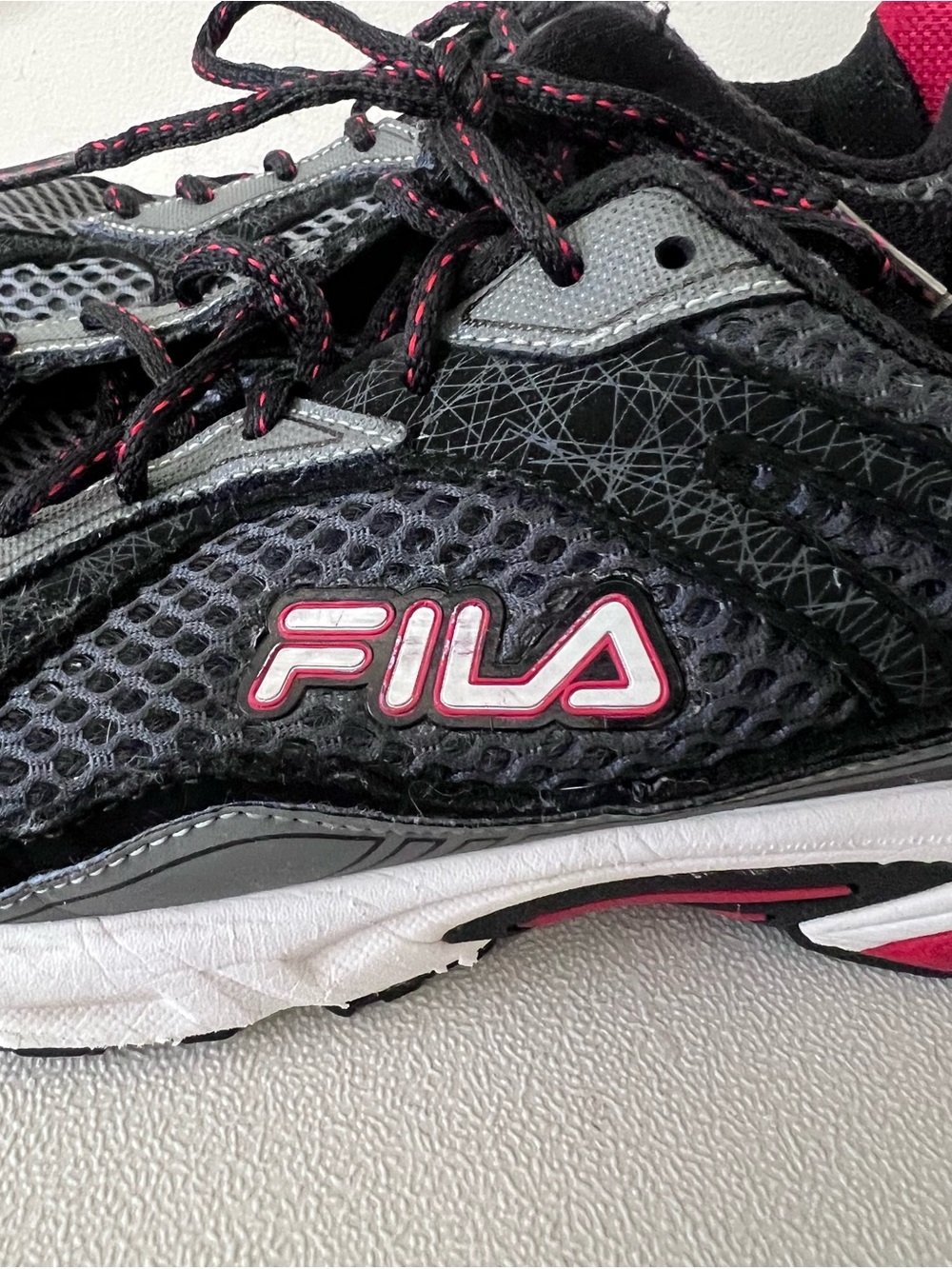 Men’s Size 11 FILA Black Running Sneakers with red accent’s
